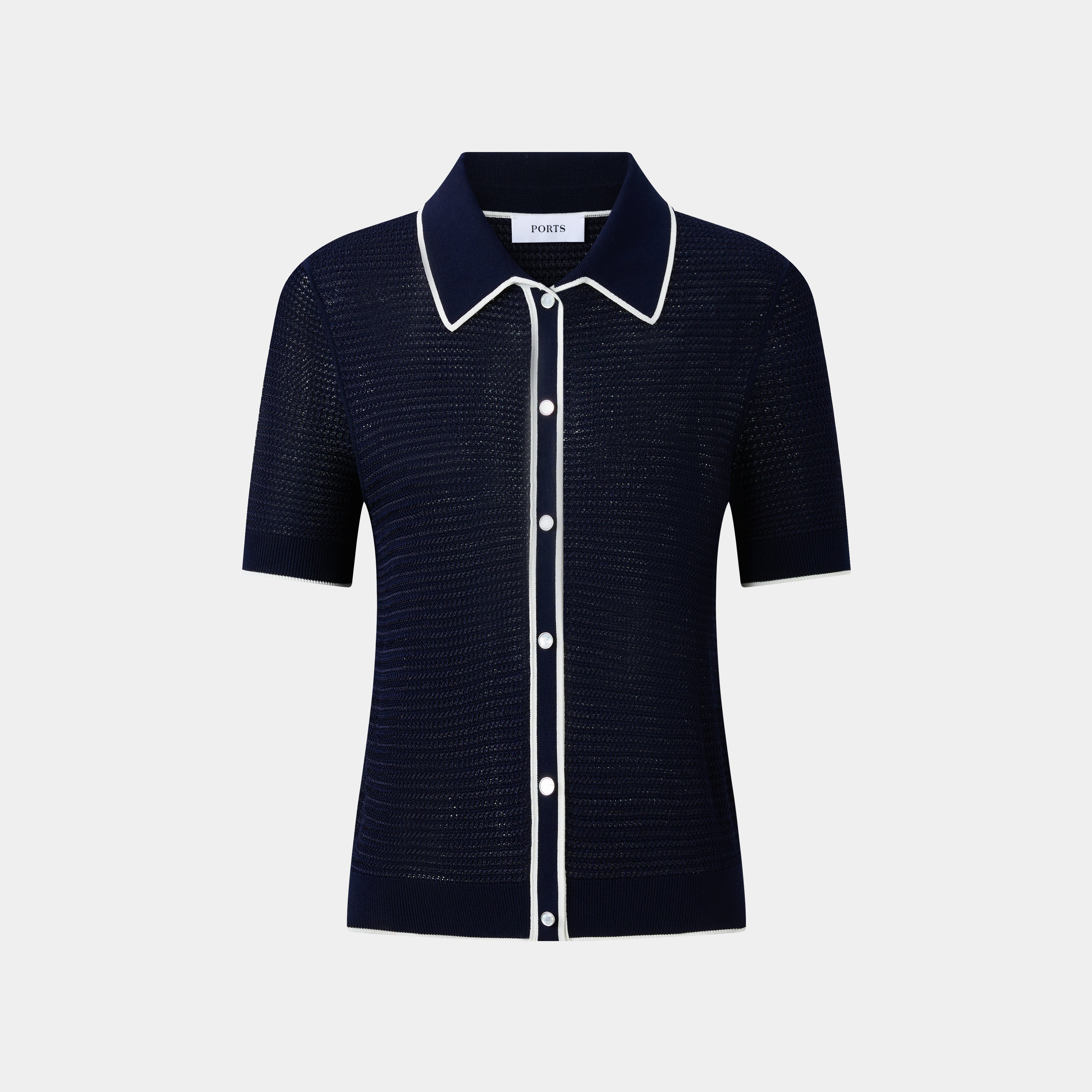 ELEGANT NAVY POLO FEATURING WHITE TRIM DETAILS, A TIMELESS WARDROBE STAPLE