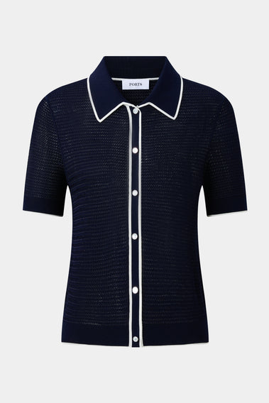 ELEGANT NAVY POLO FEATURING WHITE TRIM DETAILS, A TIMELESS WARDROBE STAPLE